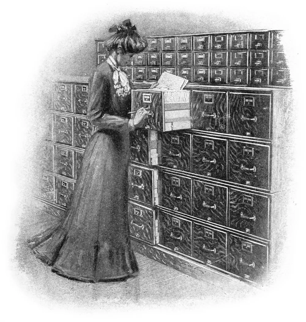 An engraving of a clerk at a tall filing cabinet, 1903