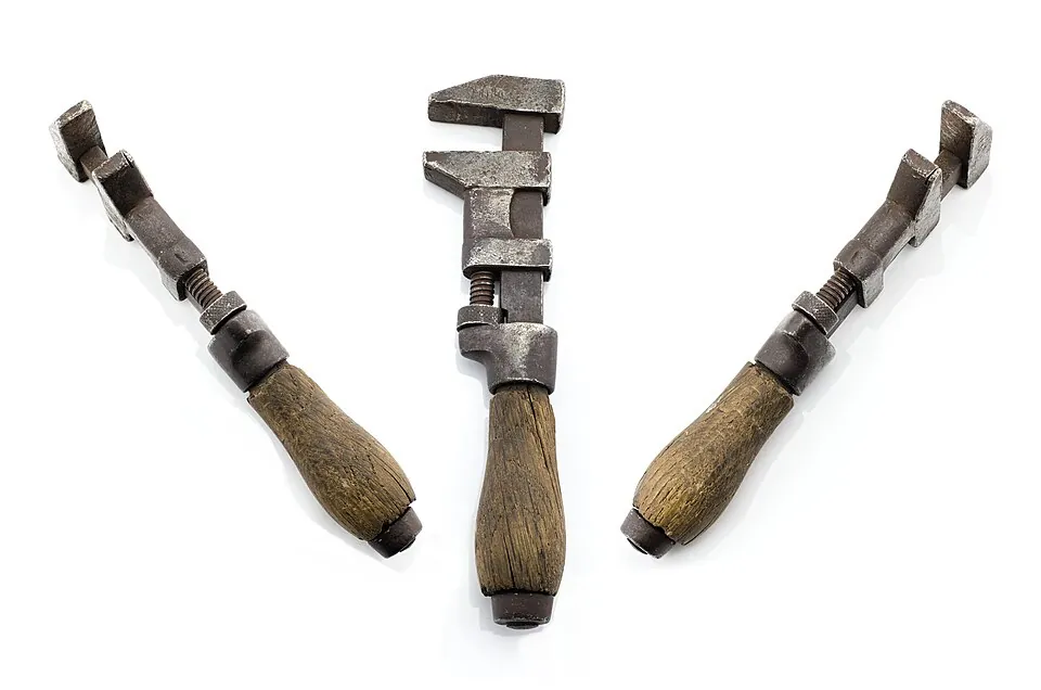 Three old monkey wrenches